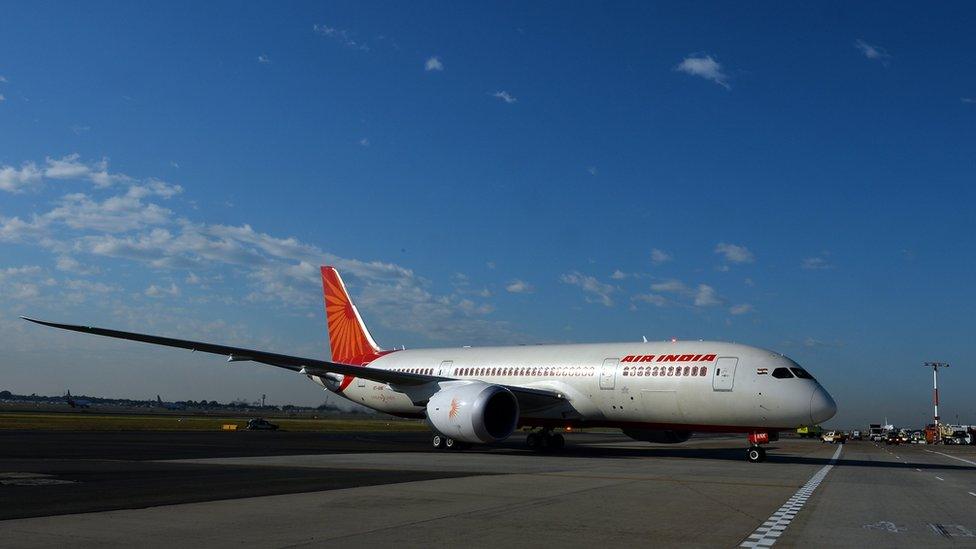 An Air India plane parked on airport tarmac