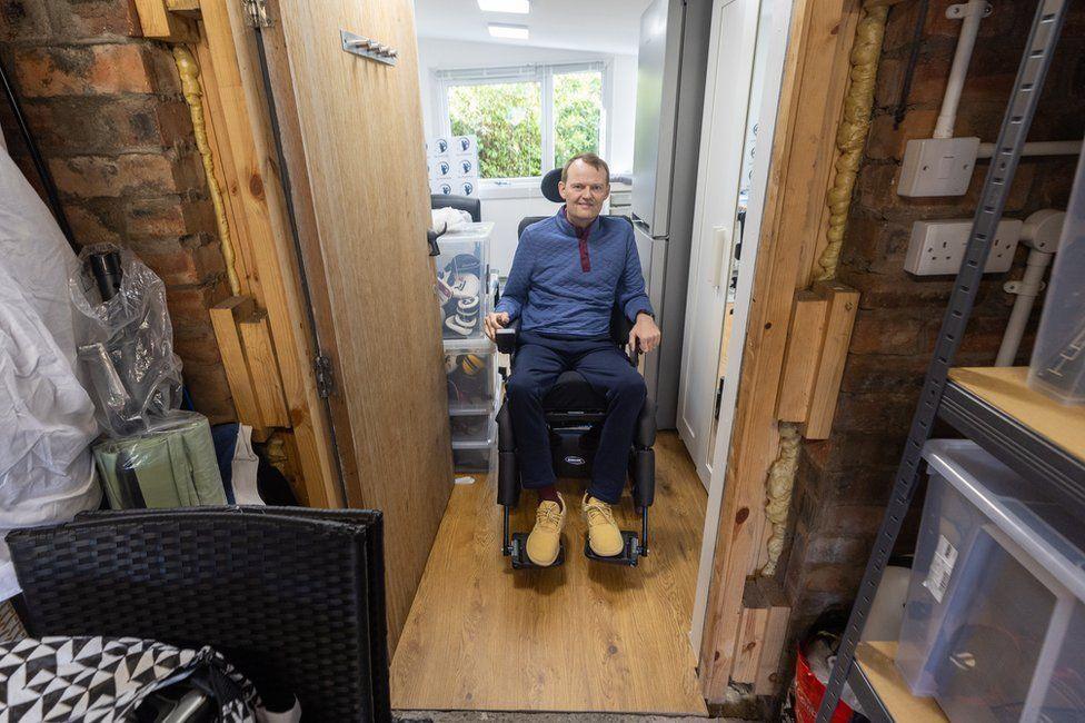 Scott Stewart sits in his wheelchair in his adapted home in Stirling