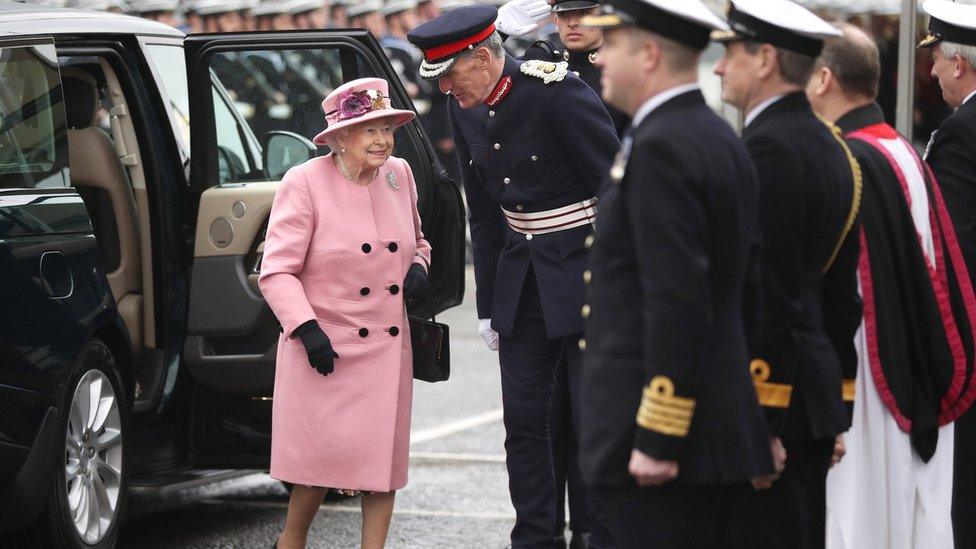 The Queen next to HMS Ocean