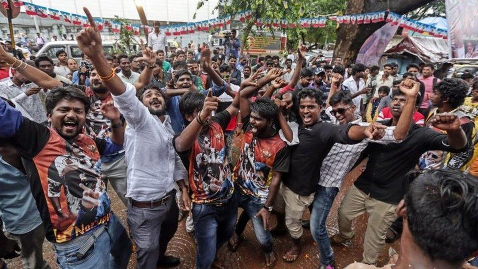 Indian fans of superstar Rajinikanth dances as they celebrates his much awaited film "Kabali" at Aurora theatre in Mumbai, India, 22 July 2016