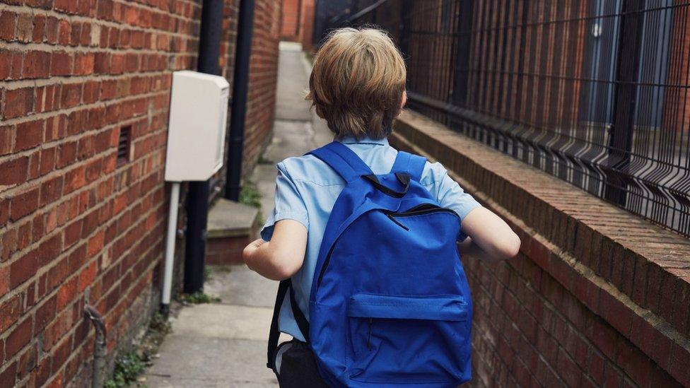 Child with backpack