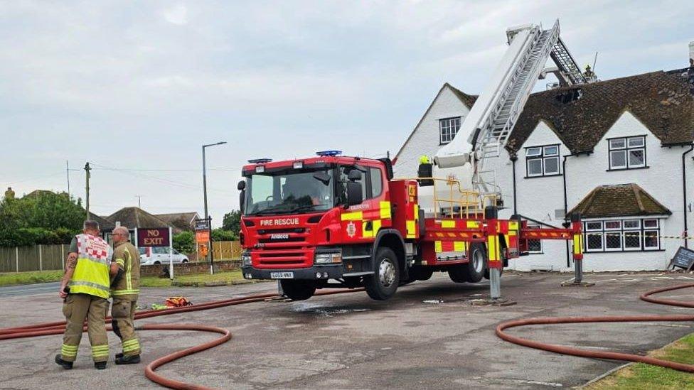 A fire engine outside the Oakwood Inn