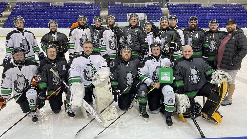 Sheffield Mavericks squad on the ice with the first aid kit