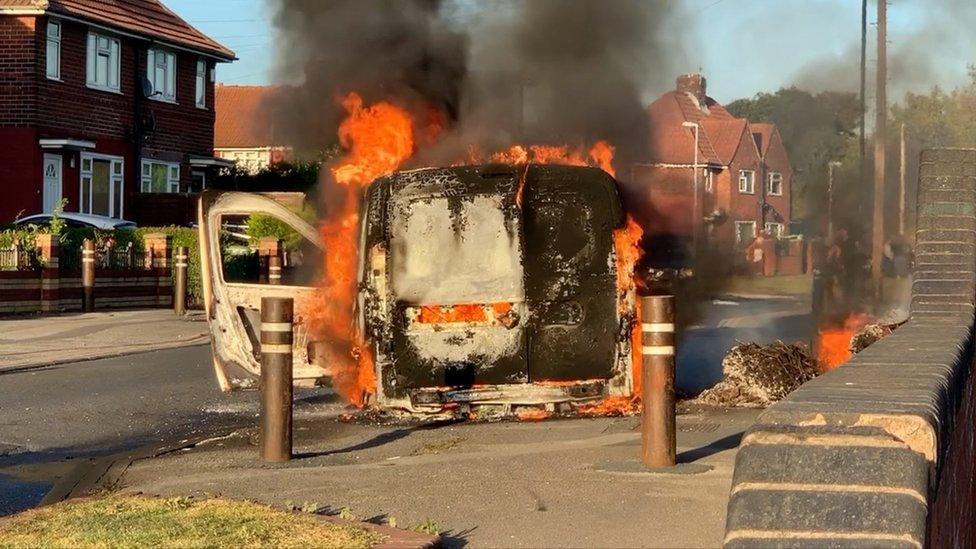 The burning van