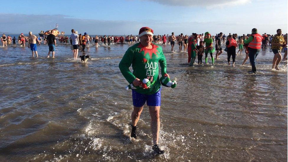 Tenby Boxing Day swimmers in the sea