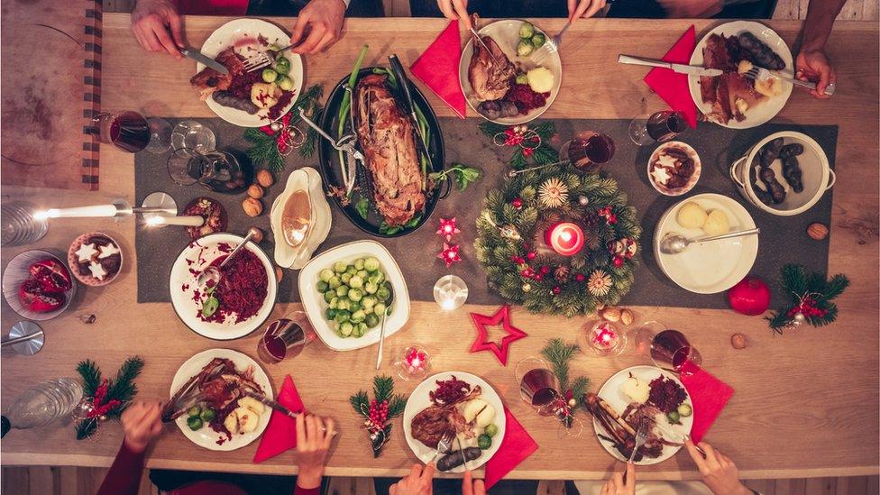 A table of Christmas food