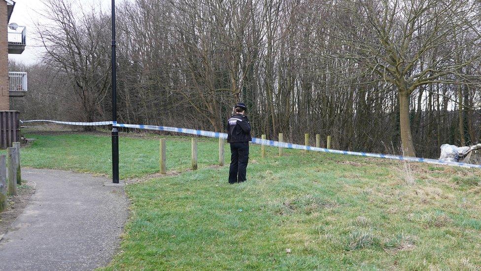 A police officer standing guard