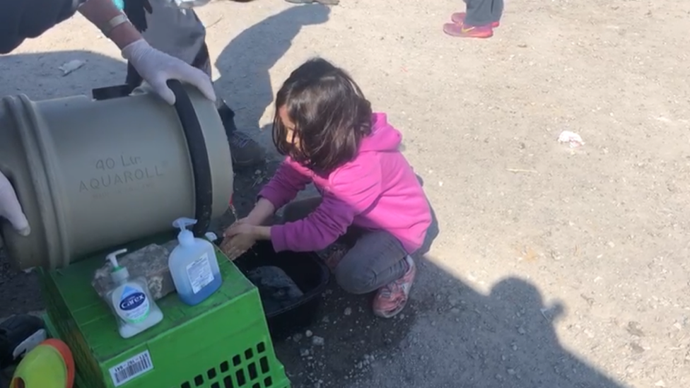 Child washes hands