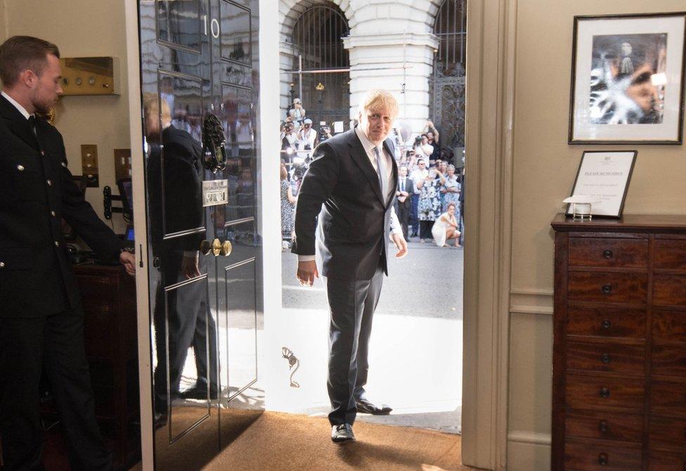 Boris Johnson enters 10 Downing Street