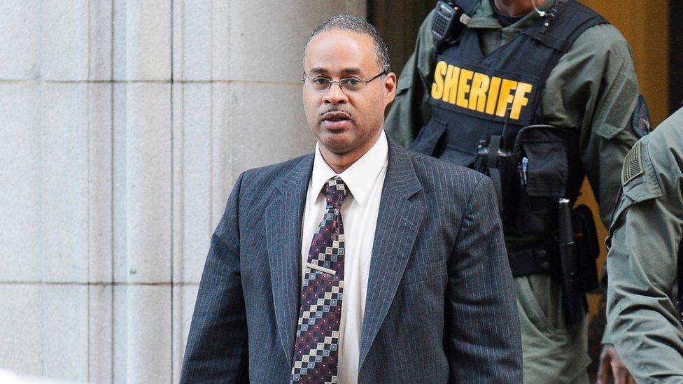 Baltimore Police officer Caesar Goodson leaves the courthouse at the end of day four of the murder trial of black detainee Freddie Gray.