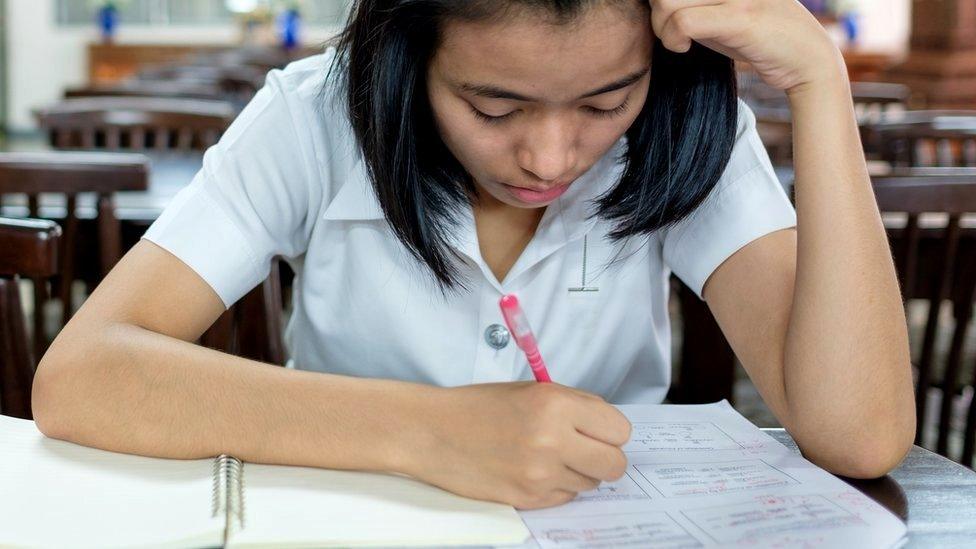 Student studying in library