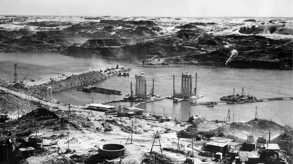 The construction of the High Aswan Dam across the river Nile in 1964