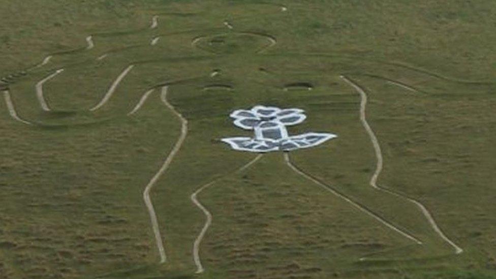 defaced Cerne Abbas giant