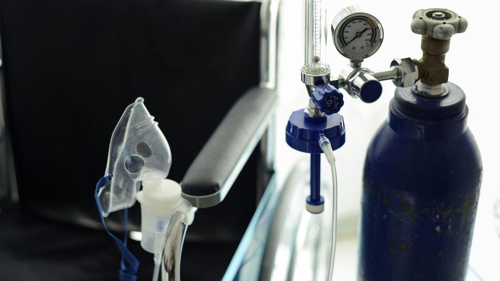 Medical Oxygen Tube And The Wheelchair Behind It