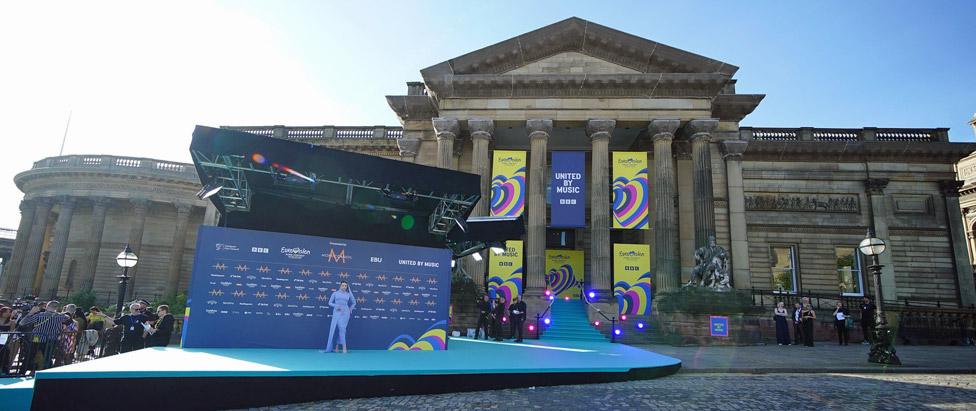 Mae Muller on the Eurovision turquoise carpet in Liverpool