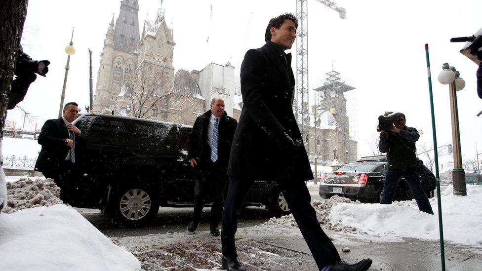 Trudeau arrives at a news conference in Ottawa, Ontario, on 12 December 2016