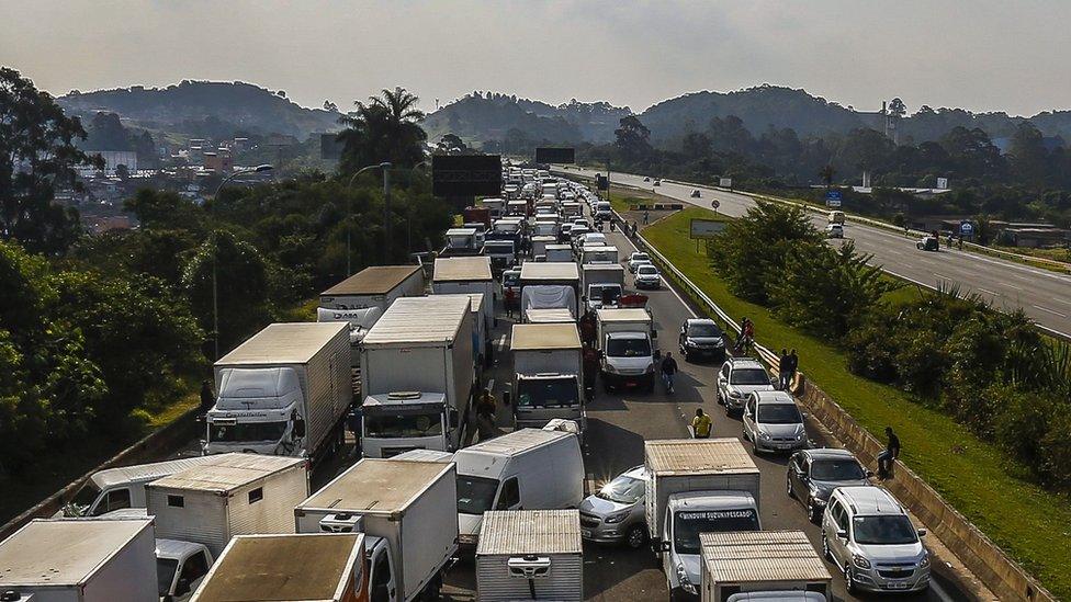 Truckers block a highway near Sao Paulo