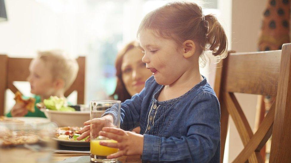 girl drinking juice