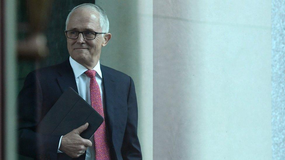 Malcolm Turnbull smiles as he walks into the cabinet meeting in Canberra (21 Aug 2018)