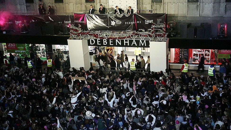 Westlife switched on Oxford Street's Christmas lights from Debenhams in 2005