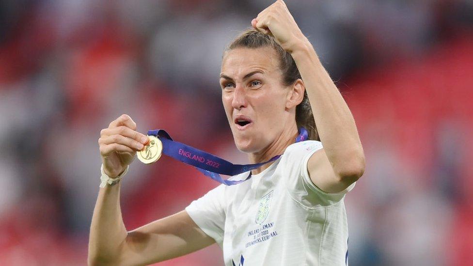 Jill Scott celebrating with her Euro 2022 medal