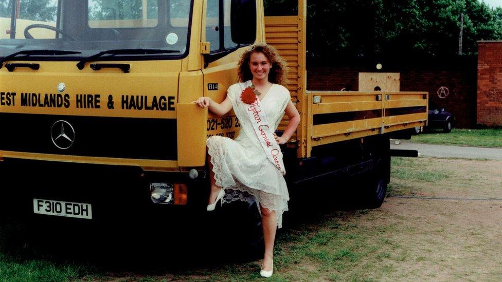 Tipton Carnival Queen posing next to haulage truck