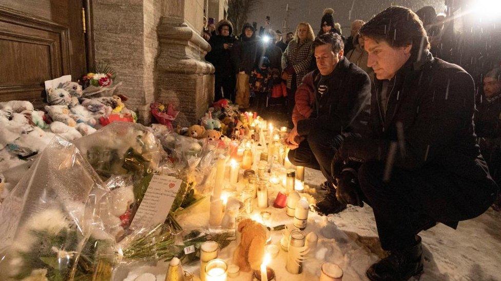 Mr Trudeau laid flowers at a memorial outside a church