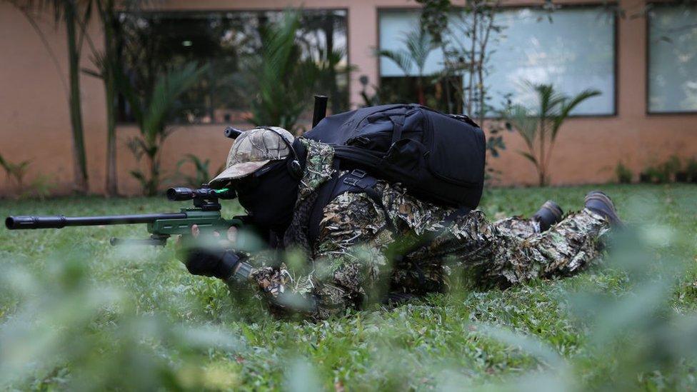 A cosplayer dressed in Ghillie Suit of PUBG poses for a picture during the Comic con at Mumbai, India on December 22, 2018