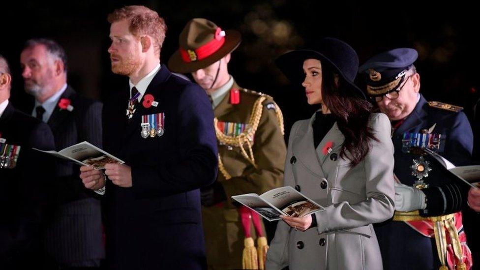 Prince Harry and his fiancée Meghan Markle attend the Dawn Service at Wellington Arch