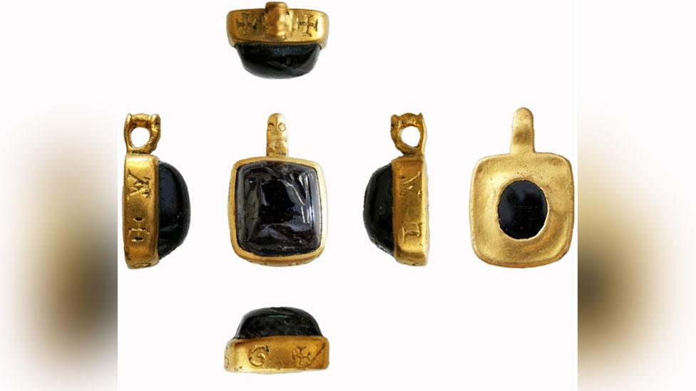 Late 12th to early 13th Century gold and gem pendant