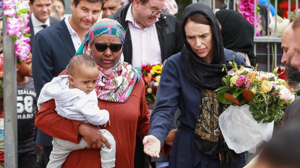 Prime Minister Jacinda Ardern visits mourners at the Kilbirnie Mosque in New Zealand