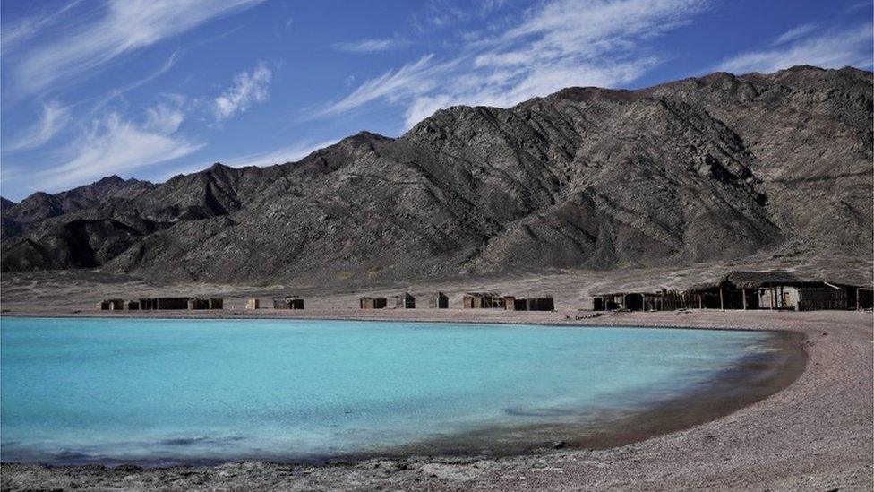 In this Saturday, January. 2, 2016 photo huts line the shore of Abu Galoum, South Sinai, Egypt