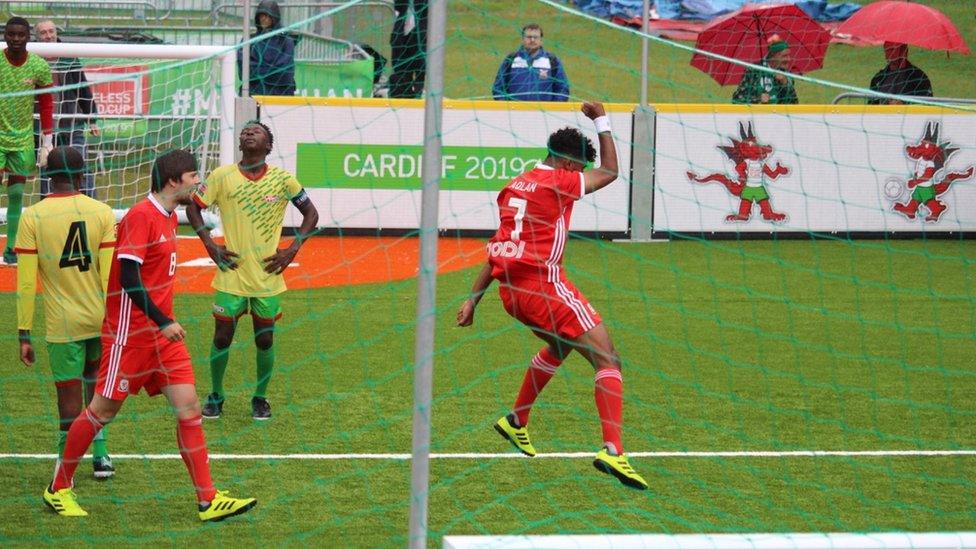 Mujahed Aqlan celebrating a goal at the Homeless World Cup