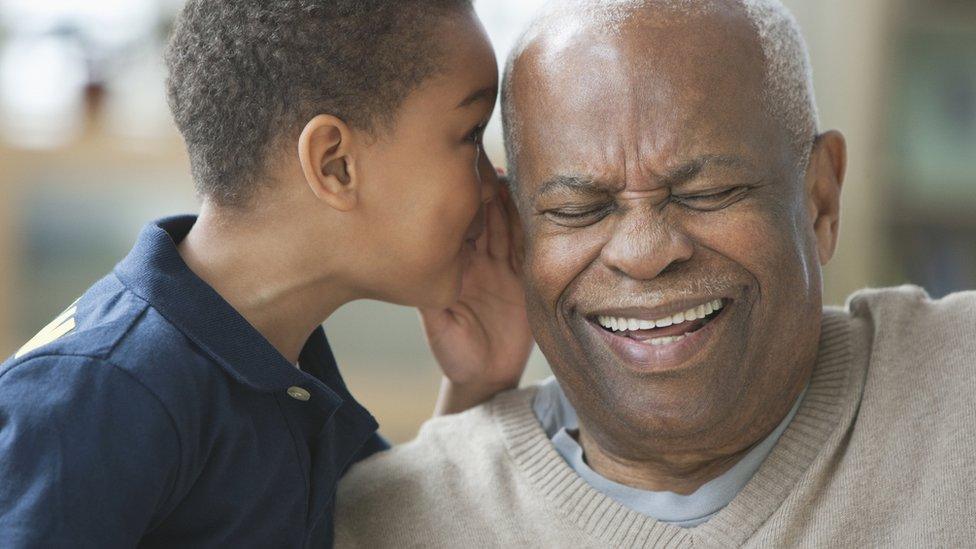 boy-making-granddad-laugh.