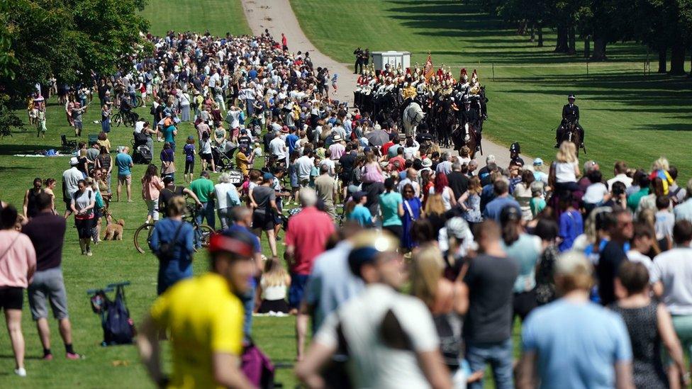 Members of the Household Cavalry make their way down the Long Walk after leaving Windsor Castle to mark the official birthday of Queen Elizabeth II.