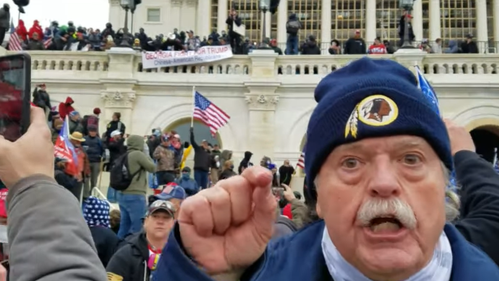 Thomas Caldwell was seen outside the Capitol in videos investigators found on his phone and computer