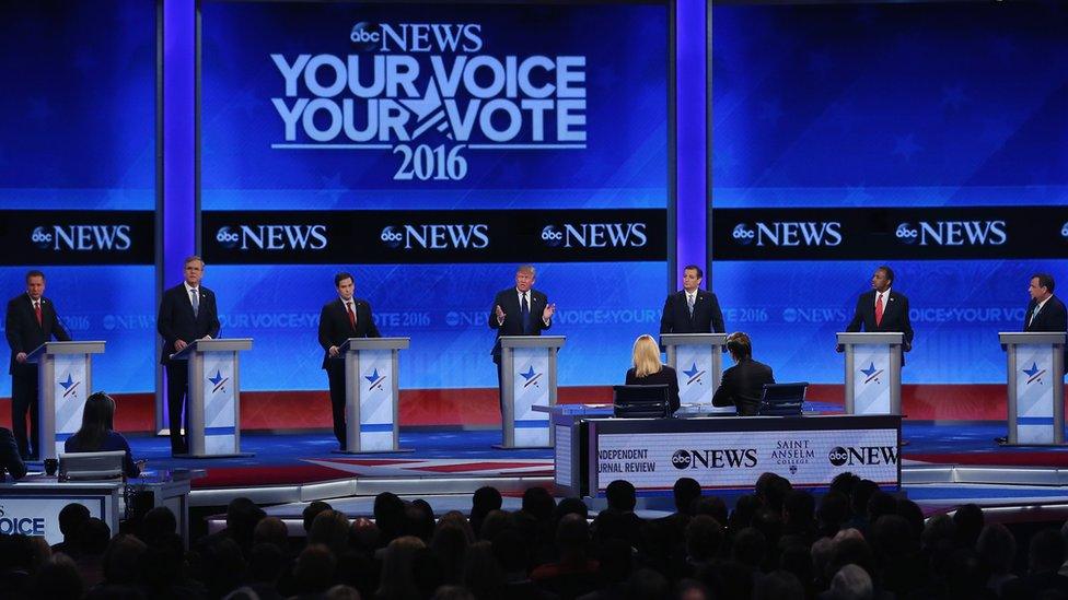 Seven candidates on stage in Manchester