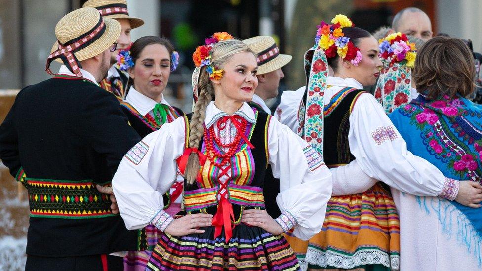 People wearing traditional Ukrainian clothing