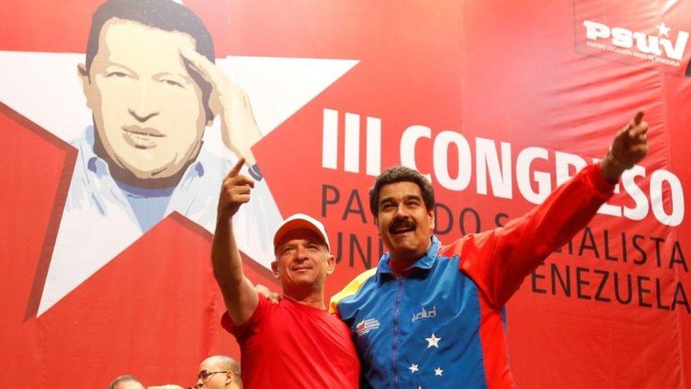 Venezuela's President Nicolas Maduro (R) embraces retired General Hugo Carvajal as they attend the Socialist party congress in Caracas, Venezuela July 27, 2014.