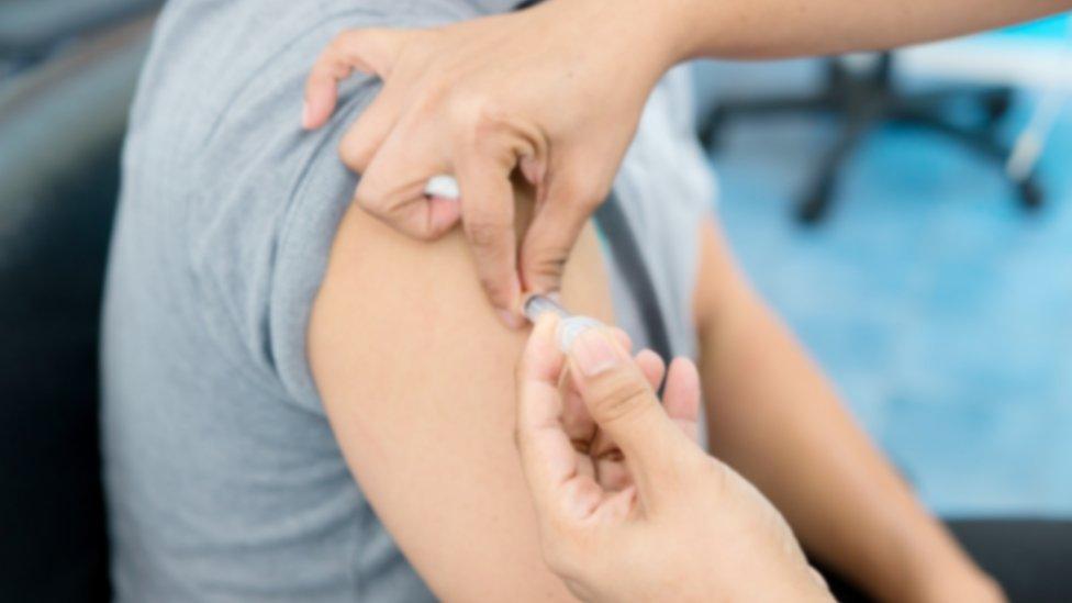 Child getting an injection