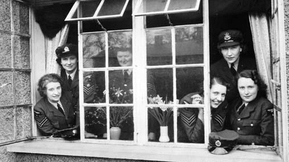 Black and white image of WAAFs looking out of window at RAF Biggin Hill