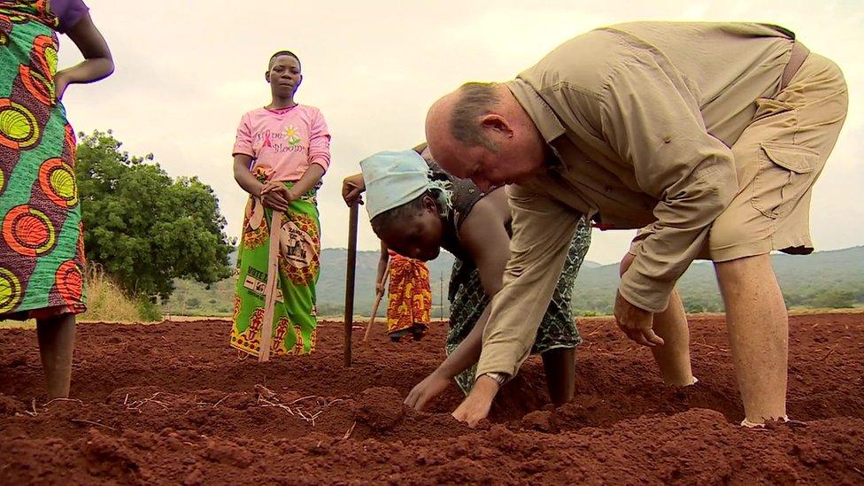 Dave Wakefield and workers at his farm