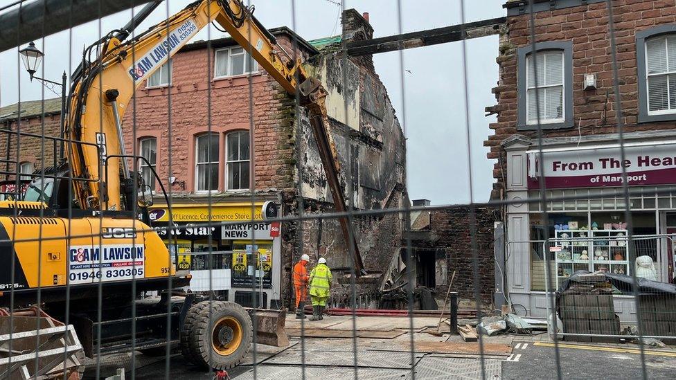 A digger demolishes the fire-hit Bakehouse in Maryport on Monday 18 March, 2024