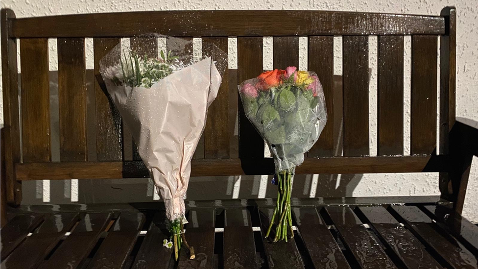 Flowers on a bench