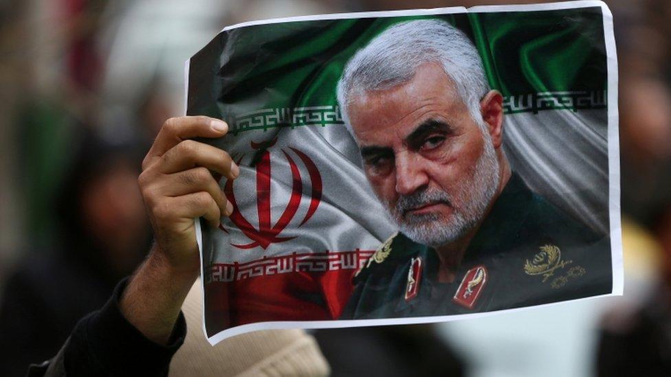 An Iranian holds a picture of late General Qasem Soleimani. 4 Jan 2020