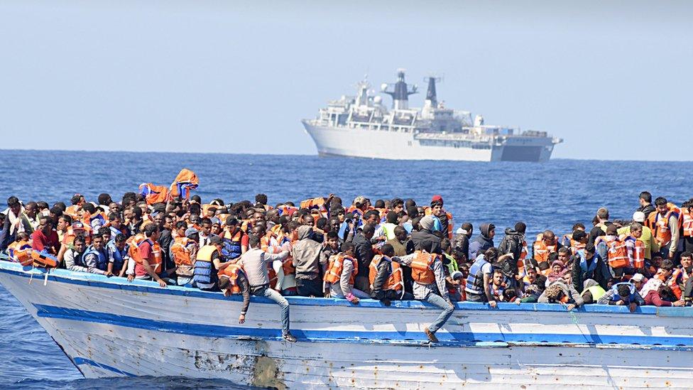 Migrants on a boat in the Mediterranean