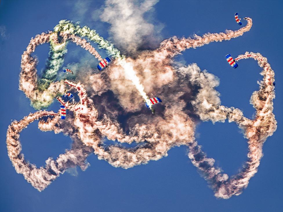 RAF Falcons take to the sky performing aerial acrobatics to a packed crowd at RAF Henlow families day.