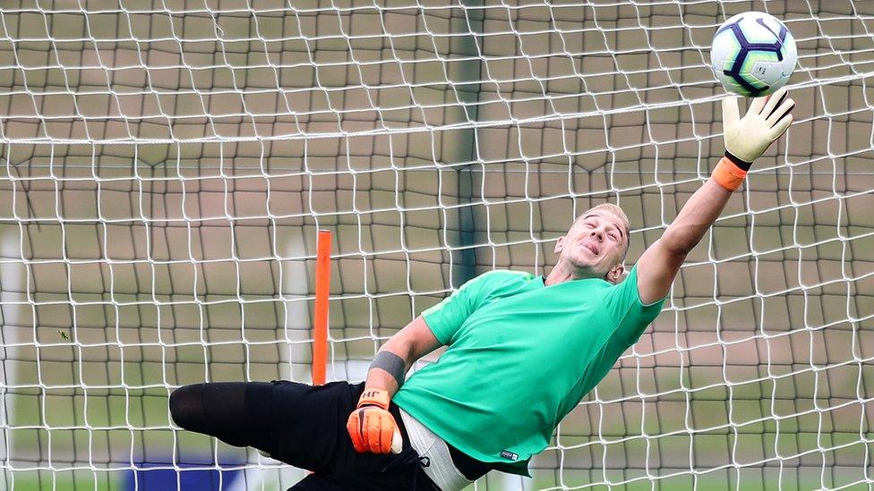 Joe Hart saves the ball