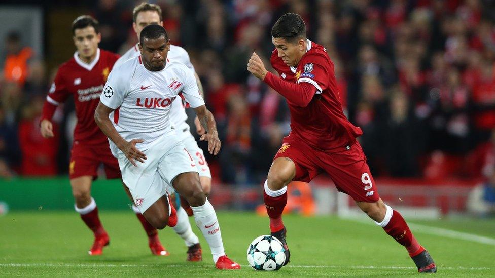 Roberto Firmino of Liverpool runs with the ball during the UEFA Champions League group E match between Liverpool FC and Spartak Moscow at Anfield on December 6, 2017 in Liverpool, United Kingdom.