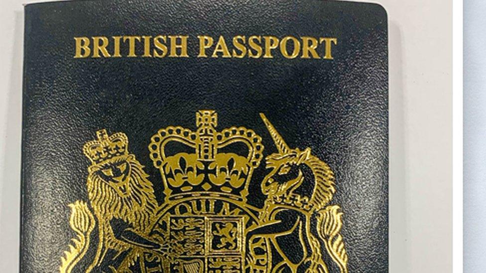 A new blue British passport alongside the current burgundy British passport